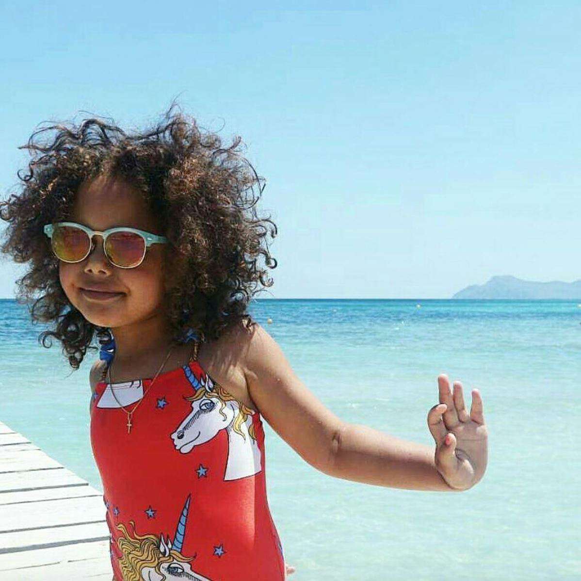 MINI RODINI GIRLS RED UNICORN PRINT SWIMSUIT 4-5 YEARS