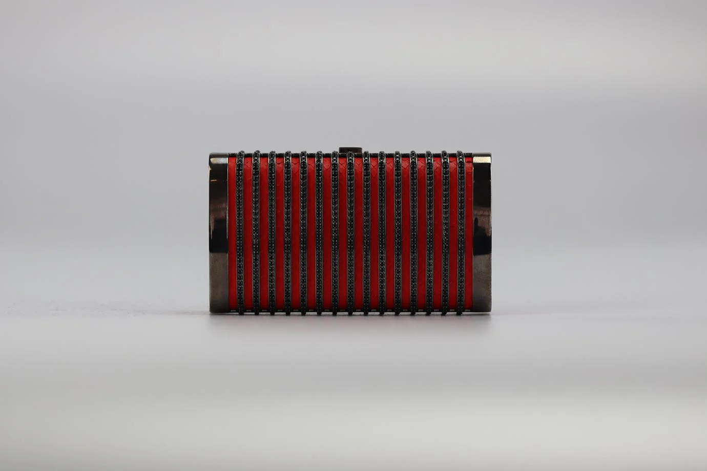 STARK CRYSTAL EMBELLISHED PYTHON AND GUNMETAL TONE CLUTCH - Image 2