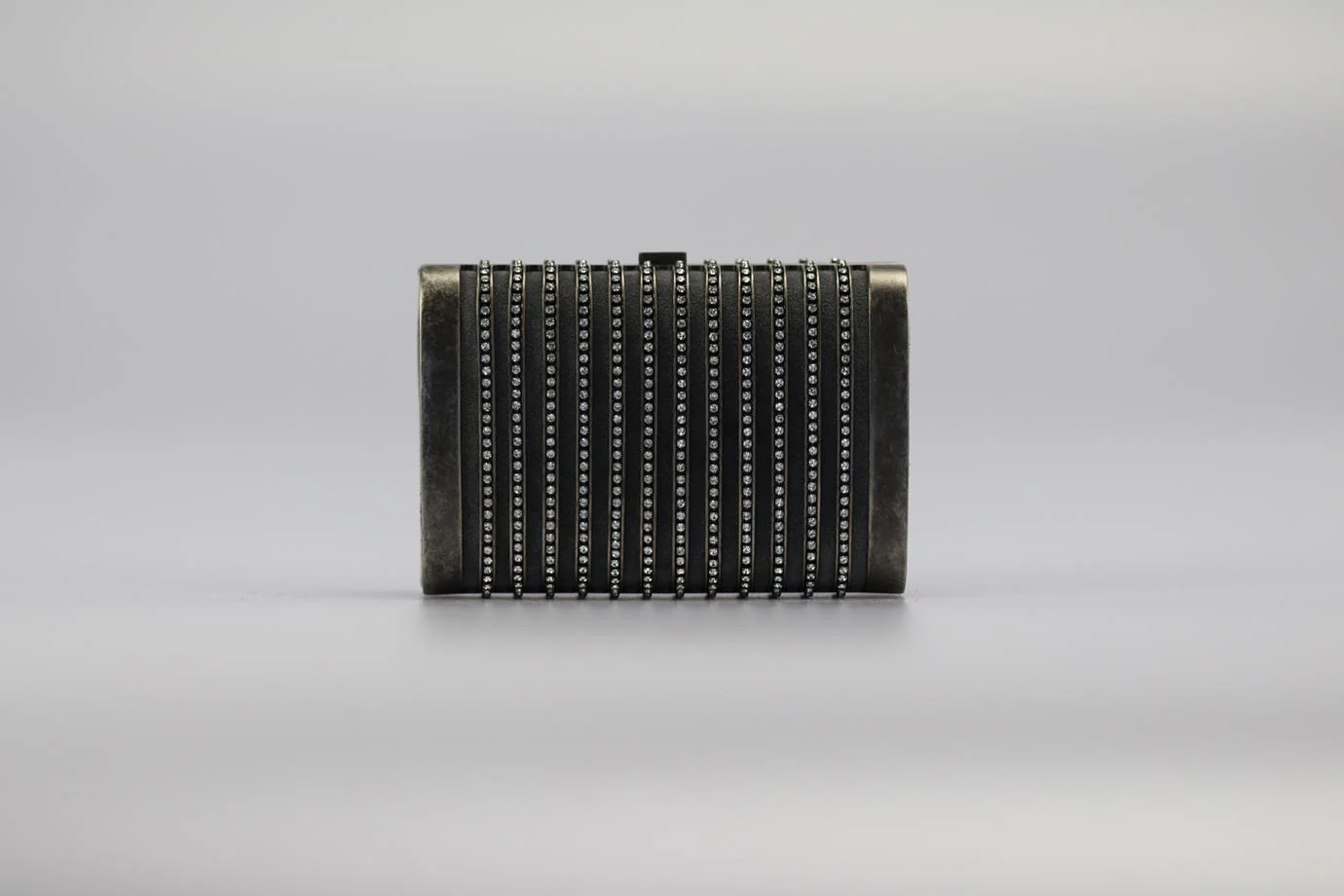 STARK CRYSTAL EMBELLISHED SUEDE AND GUNMETAL TONE CLUTCH - Image 2