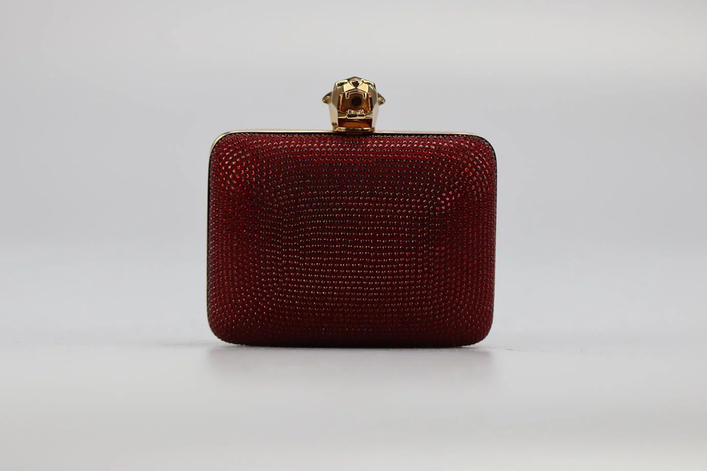STARK CRYSTAL EMBELLISHED SUEDE AND ROSE GOLD TONE CLUTCH - Image 2