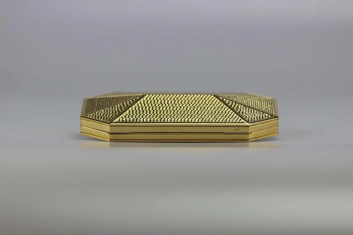 STARK EMBOSSED GOLD TONE CLUTCH - Image 6