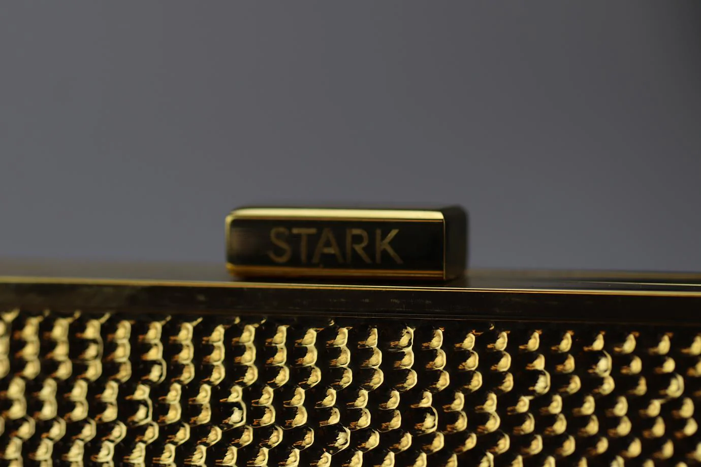 STARK EMBOSSED GOLD TONE CLUTCH - Image 8