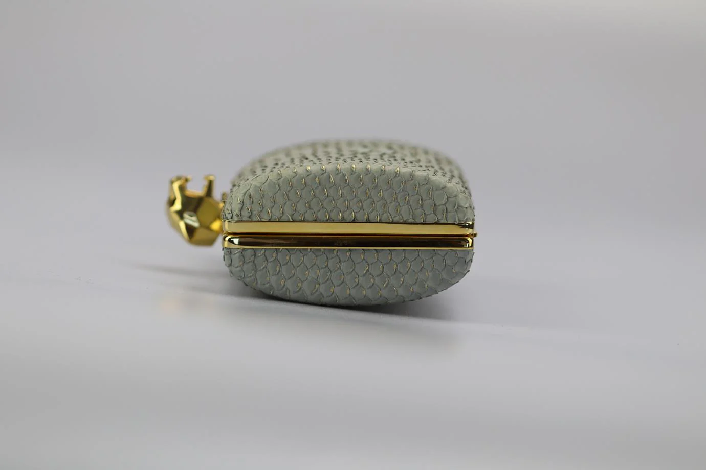 STARK PYTHON AND GOLD TONE CLUTCH - Image 5