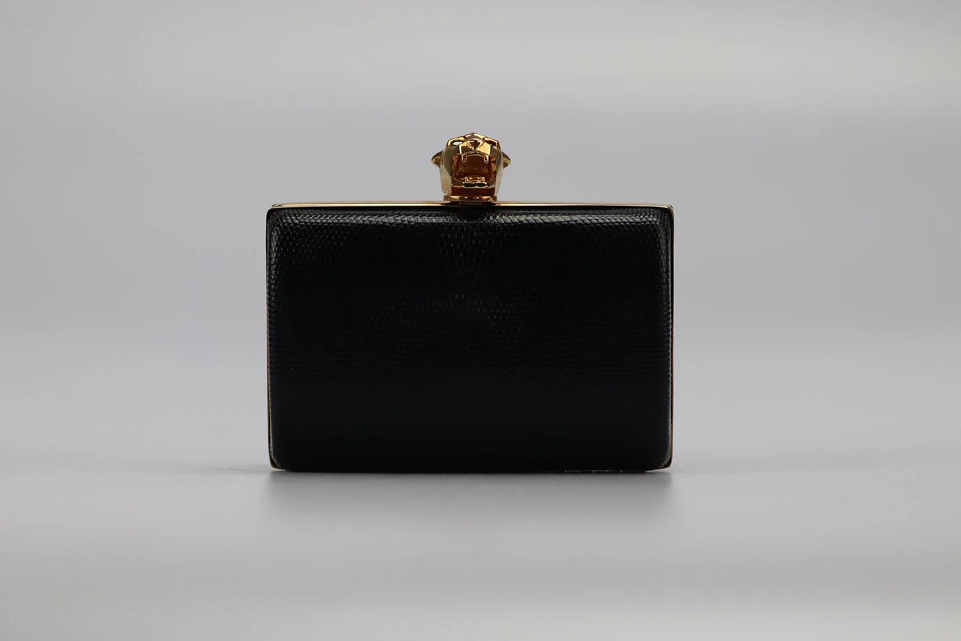 STARK SNAKESKIN AND ROSE GOLD TONE CLUTCH - Image 2