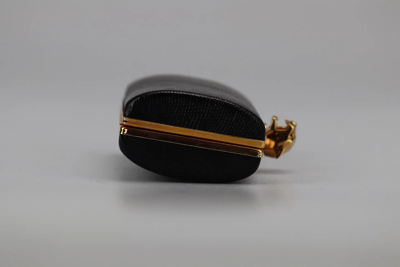 STARK SNAKESKIN AND ROSE GOLD TONE CLUTCH - Image 4